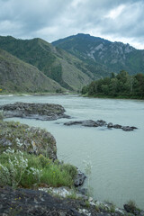 Amazing view of Altay Republic. Katun River and mountains.  Russian adventures. Mountain hiking in the Altai republic. Active holiday with family and friends. 
