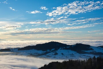 sunset over the sea of fog with a view of the hill bachtel and city zurich Photo from Alp...