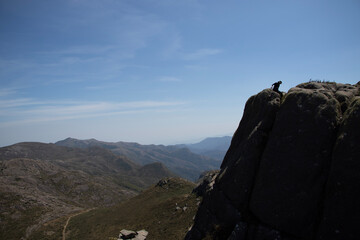 person on top of mountain