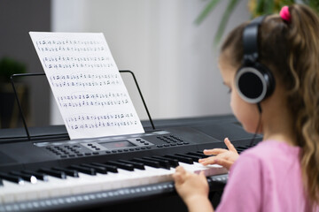 Child Girl Playing Music Keyboard Piano