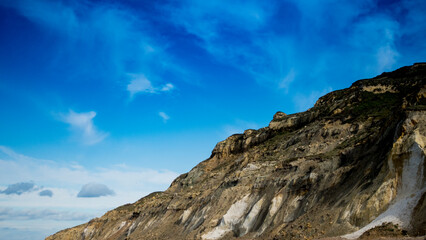 Beautiful Multicoloured Cliff Against Blue Sky