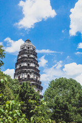 Tiger Hill Pagoda (Pagoda of Yunyan Temple) over trees on Tiger Hill (Huqiu) in Suzhou, Jiangsu, China
