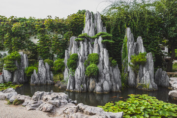 Giant rock in pond at Lingering Garden Scenic Area, Suzhou, Jiangsu, China