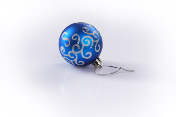 blue christmas ball on white