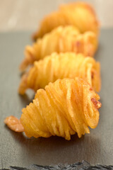 Closeup shot of tasty breaded prawns with potato noodles