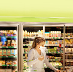 Fototapeta premium supermarket shopping, face mask,Woman choosing a dairy products at supermarket.