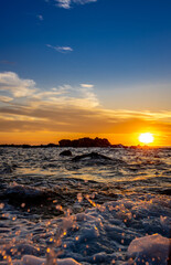 Obraz premium Sunset by the ocean in Portugal