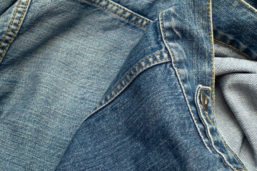 Blue denim texture with a rivet