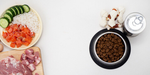 dog food includes dry pellets, treats and canned foods along with a natural diet of fresh meat, fish, rice and vegetables. choice between dry food and natural food