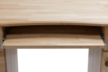 Classic writing desk with computer keyboard stand close-up.