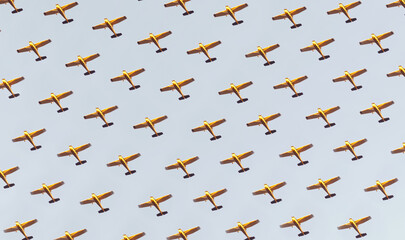 Photo of many small airplanes flying, airplane pattern.