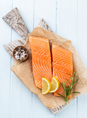 Fresh salmon steak with spinach and lentils.