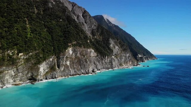 Aerial drone view over amazing blue sea at Taroko National Park coastline, Taipei, Taiwan.
Mid angle, traveling movement, HD.