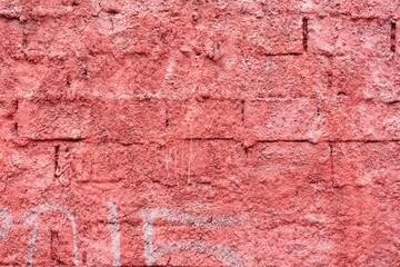 Wall brick red plaster background