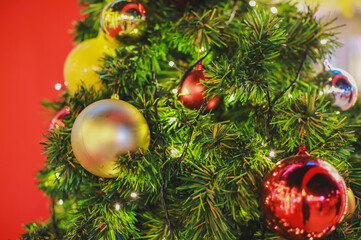 Blurry of Christmas and New Year's balls with beautiful decorations on the Christmas tree, soft light, beautiful background images and illustrations.	
