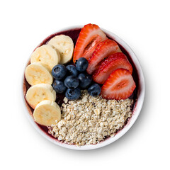 Brazilian frozen açai berry ice cream bowl with strawberries, bananas, blueberry and oatmeal flakes. isolated on a white background. Summer menu top view