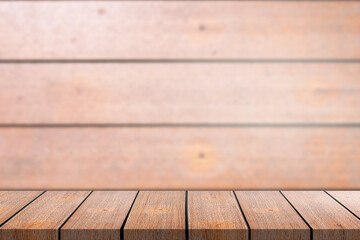 Empty wooden board empty table in front of blurred background. Perspective brown wood vintage background - can be used mockup for display or montage your products. free space.