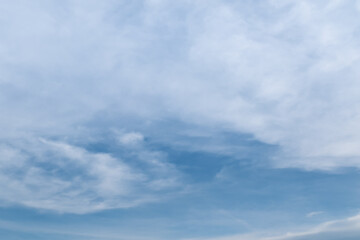 White Cirrostratus clouds on blue sky in sunny day.