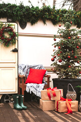 Caravan mobile home with terrace, Mobile home decorated with Christmas decor. Festive atmosphere -...