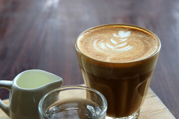cup of hot latte art coffee