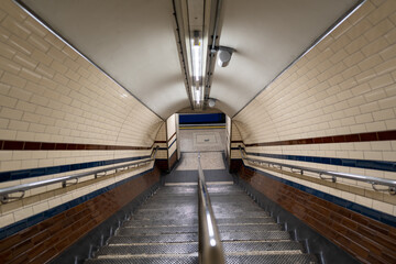 empty stairs in a subway tube station in London