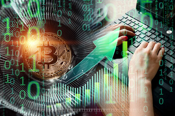 Bitcoin and blockchain concept, rise and fall of bitcoin price. Cryptocurrency, electronic money. Bitcoin with price chart and hands on keyboard background.
