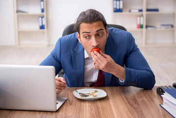 Young businessman working in the office