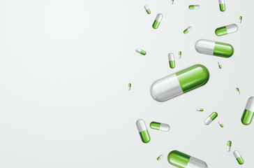 Colored medical pills are falling on a light background. Concept for pharmaceuticals, pills, medication cost.