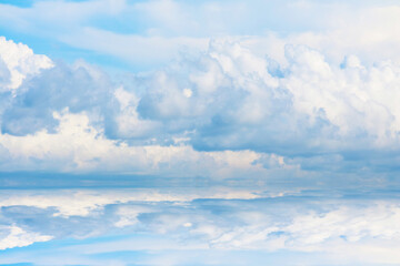 Reflection pure clear blue sky huge white gray cloud and sunlight shiny on water