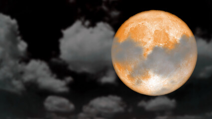 Super cold moon rise back blur dark cloud on the night sky