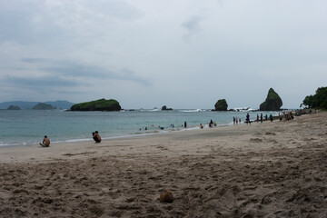Tanjung Papuma Beach is a tourist destination in Jember district. A suitable place to enjoy sunrise and sunset in one area.