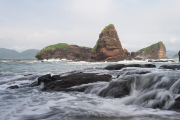 Tanjung Papuma Beach is a tourist destination in Jember district. A suitable place to enjoy sunrise and sunset in one area.