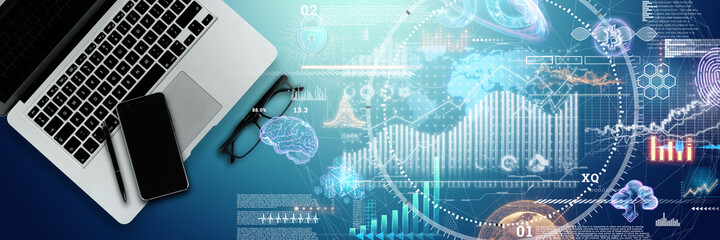 Financial chart hologram, graph on office laptop top view. Concept for analytics, business, banking and accounting, investment. Mixed media.