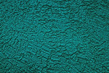 The wall is made of plaster. Rough surface. Solid color abstract background. A template for the design of a website or ad.