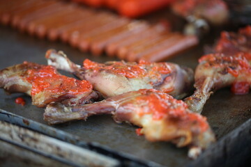 fresh fish and seafood grilled on a street cafe close-up