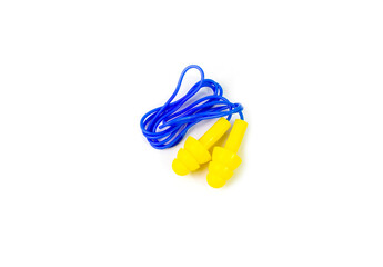 Yellow ear plugs on white background