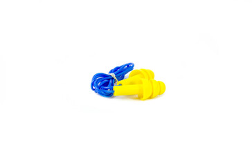 Yellow ear plugs isolated on white background.