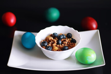 A healthy breakfast cereal with milk and fruit. Oat and corn flakes with chocolate and yogurt. The concept of healthy and vegetarian food.
