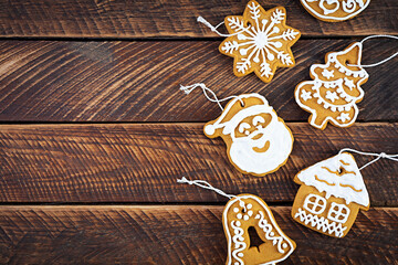 Christmas homemade gingerbread cookies on wooden background. Top view