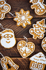 Christmas homemade gingerbread cookies on wooden background. Top view