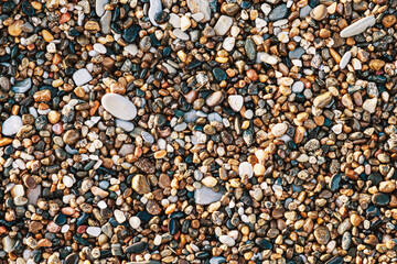 Pebbles beach, stones background. Colorsful natural. Horizontal