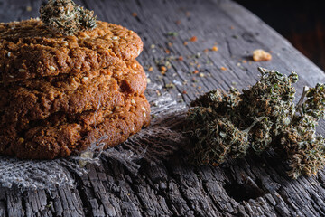 biscuits with hemp on an old wooden background close-up. rustic. Horizontal orientation.