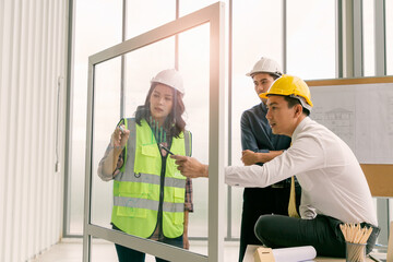 Groups of construction engineers working together in workplace site planning for the renovation.