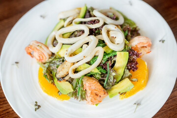 Cold appetizer - meat, sausage, ham, vegetables, onions, herbs. Food for lunch