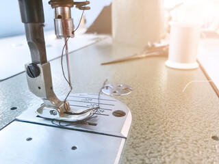 Close-up sewing machine pattern texture background.