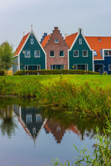 Volendam is a town in North Holland in the Netherlands. Colored houses of marine park in Volendam.