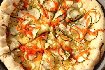 vegetarian pizza with peppers and zucchini