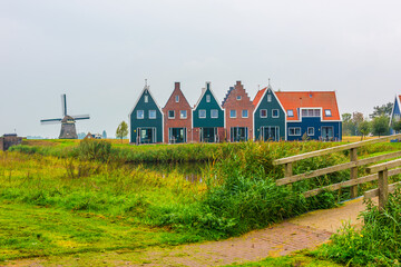 Fototapeta premium Volendam is a town in North Holland in the Netherlands. Colored houses of marine park in Volendam.