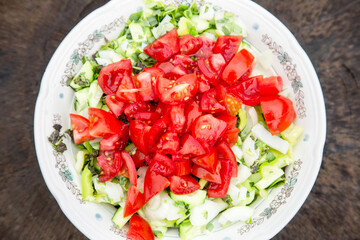 Salad of fresh tomatoes and cucumbers