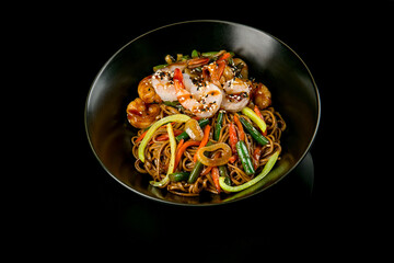 Buckwheat noodles with shrimps and vegetables. Japanese food